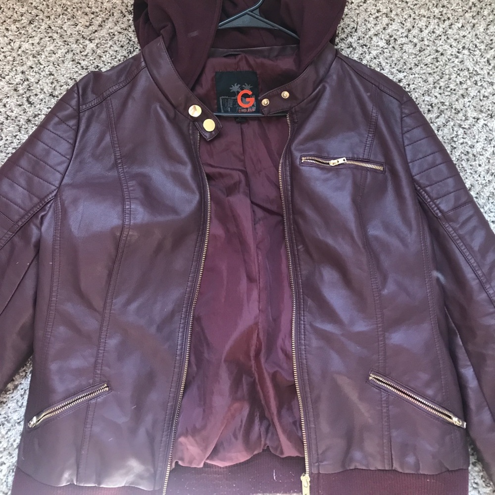 woman’s burgundy guess jacket