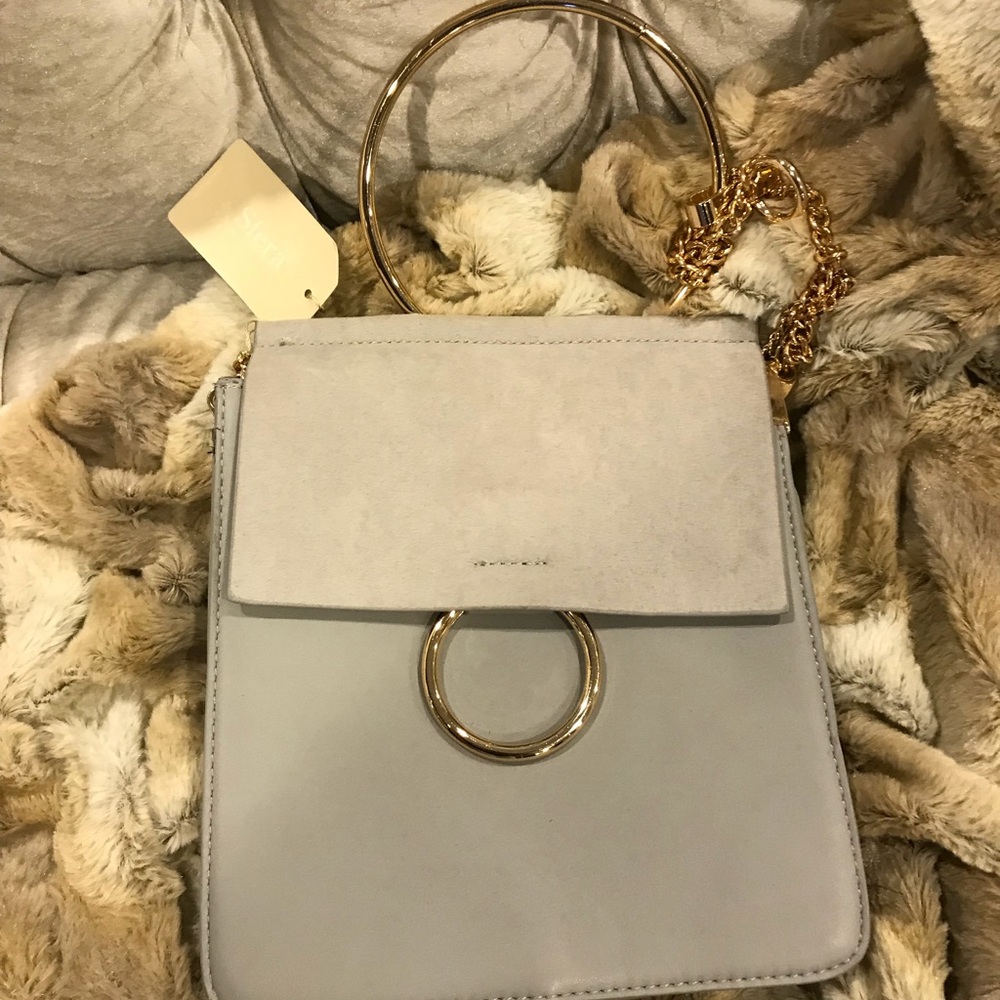 Grey long chain, cross body, handle bag