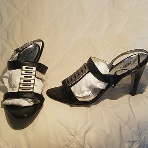 Black and sliver hardware with 3.5" heel
