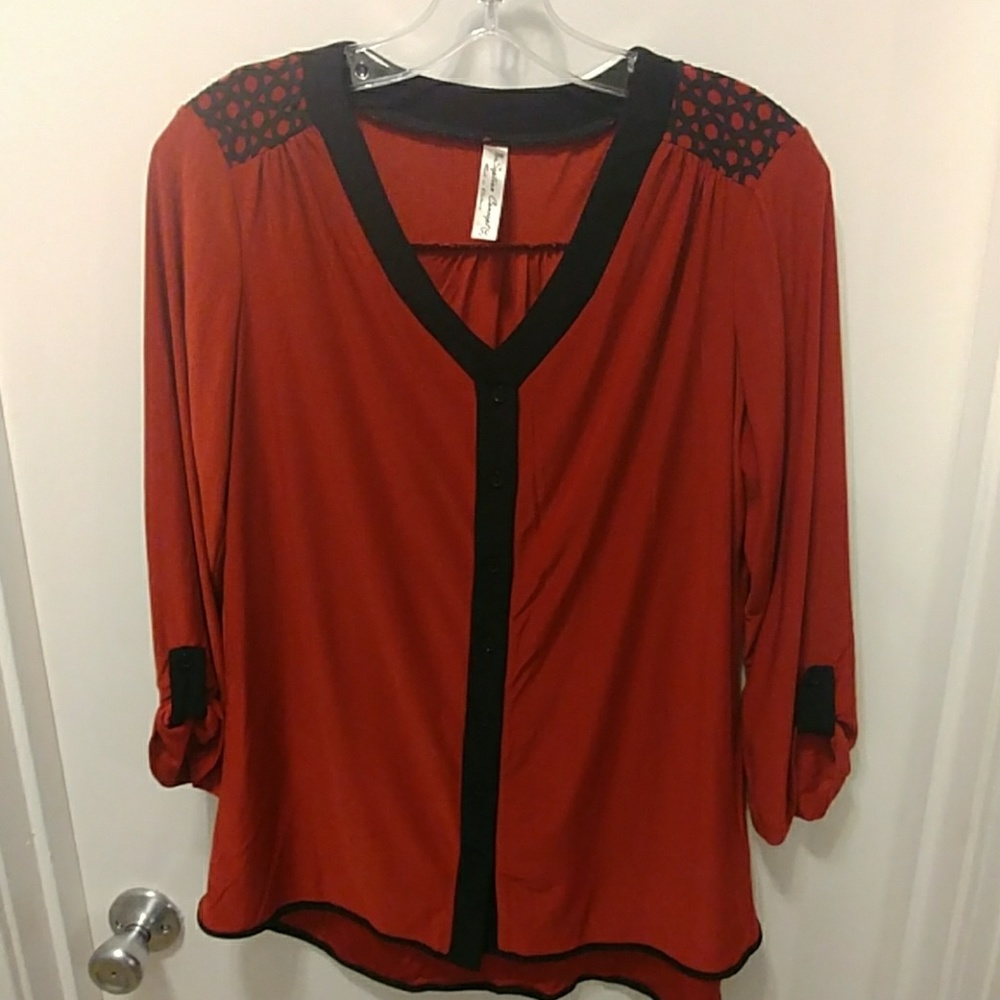Rust orange and black vneck blouse