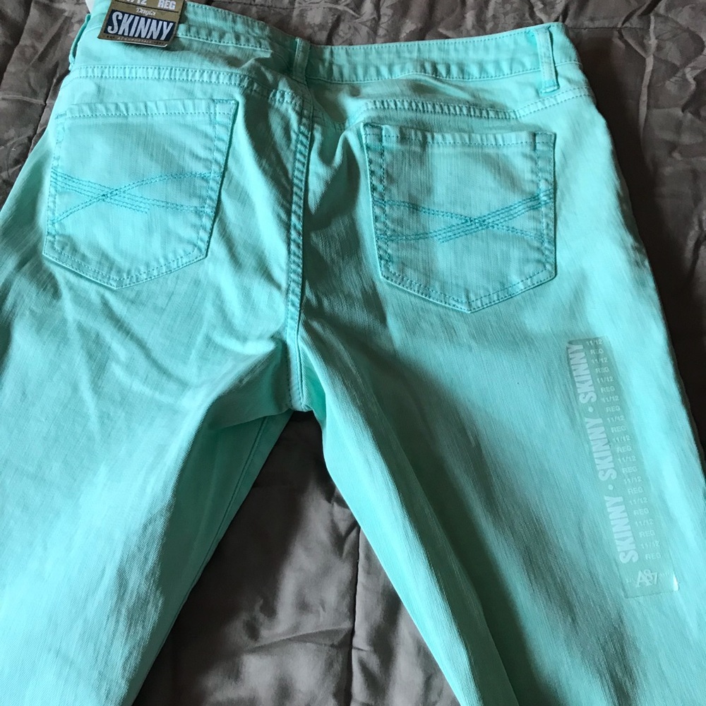 New with tags mint green skinny jeans