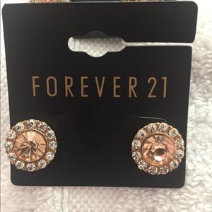 Round stone peach stone with diamonds earrings