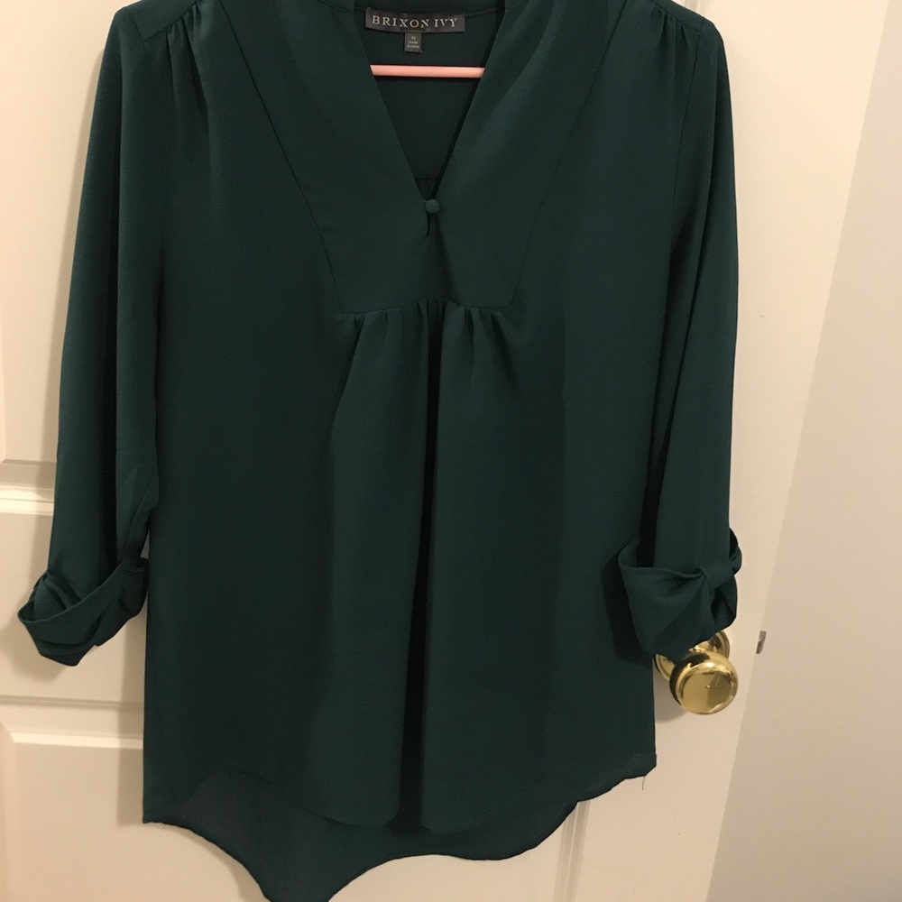 Rich green high low blouse.