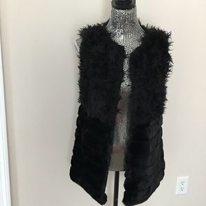 Black faux fur vest