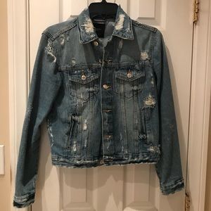 Distressed denim jacket
