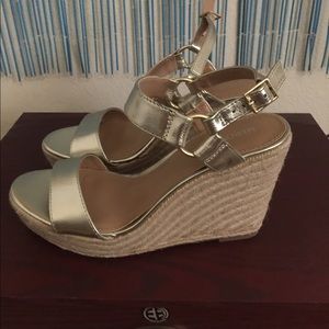 Never worn Gold metallic wedges!!