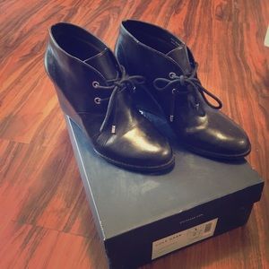 Black leather wedges