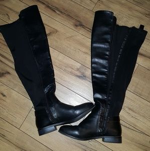 Thigh high, wide-leg black boots