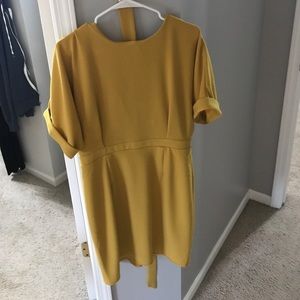 Women's mustard dress.