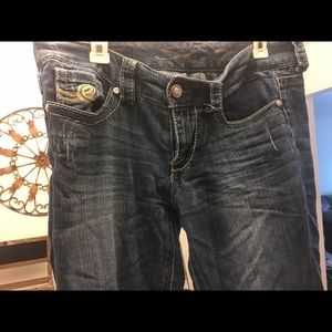 Jeans with gold trimming