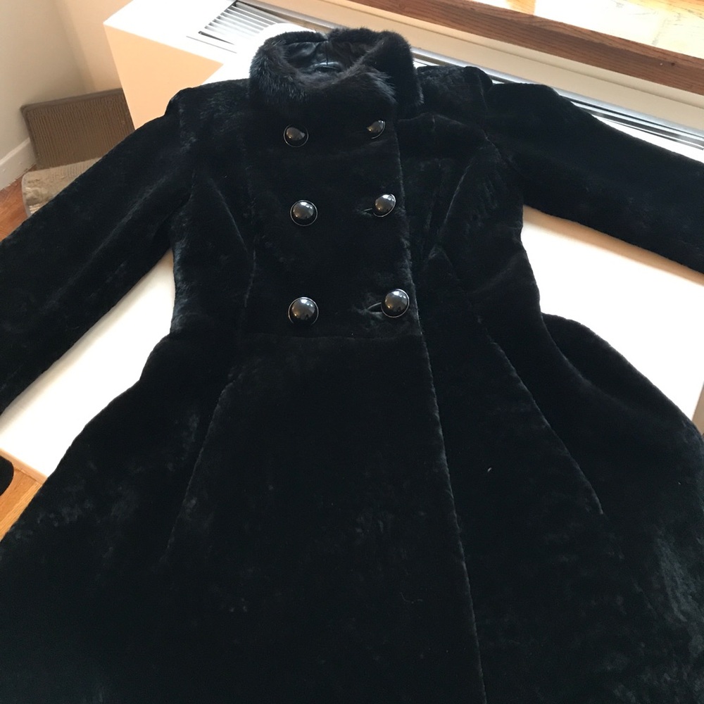 Lambskin fur coat with mink collar.