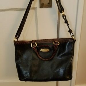 Gently used Brahmin black leather satchel w trim