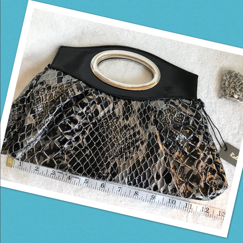 NWT Rolling Sage clutch