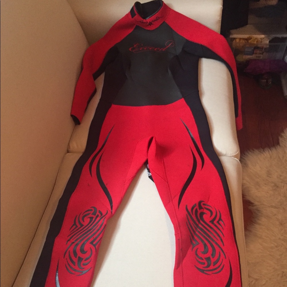 Red women’s exceed wetsuit