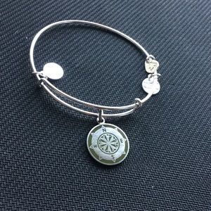 Bare worn Alex and Ani Compass Bracelet