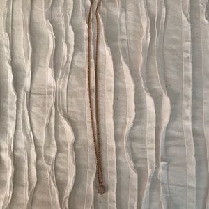 Kendra Scott necklace: rose gold