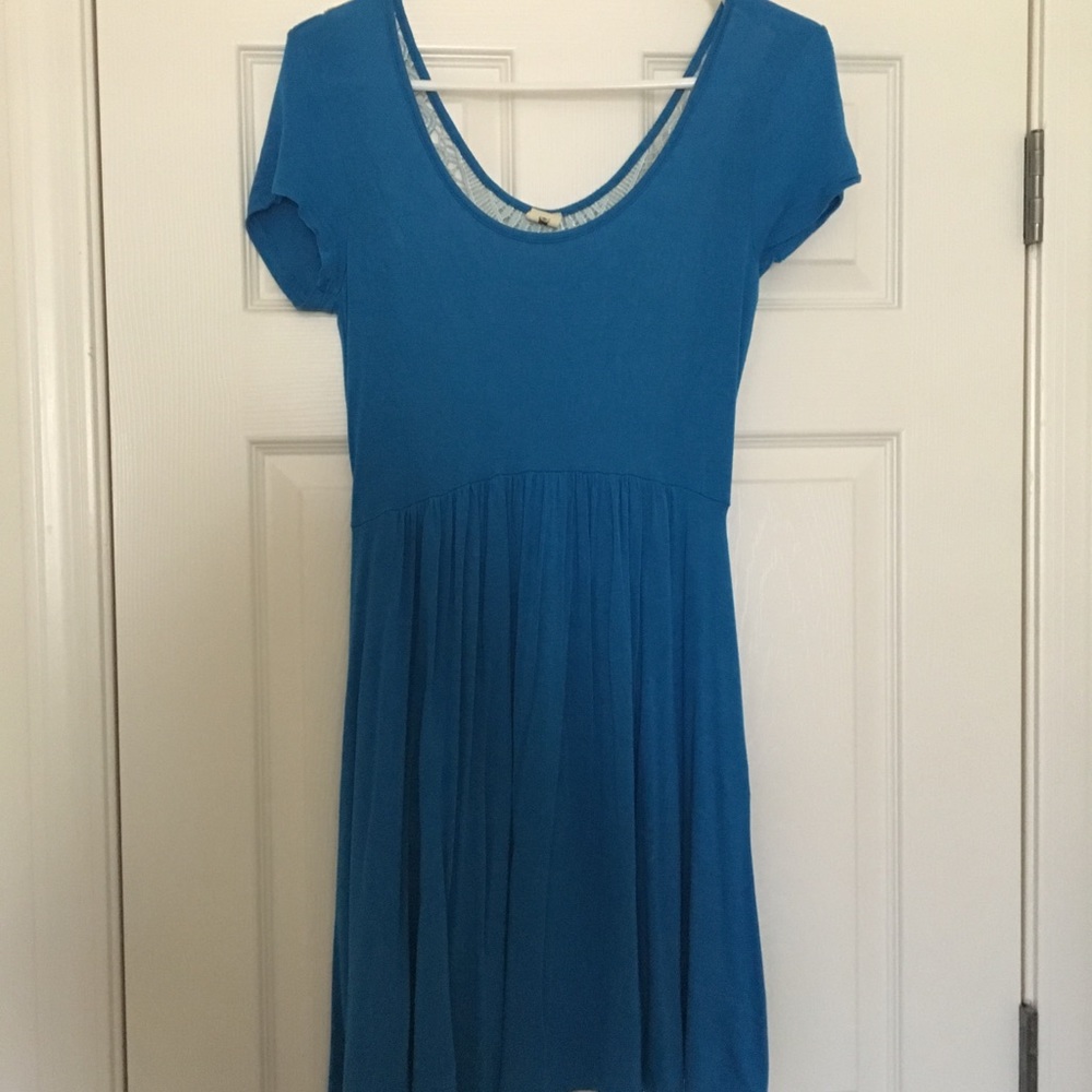 Thread and needle dress with embellished back