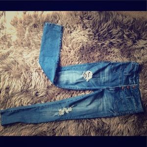 High-waisted distressed jeans