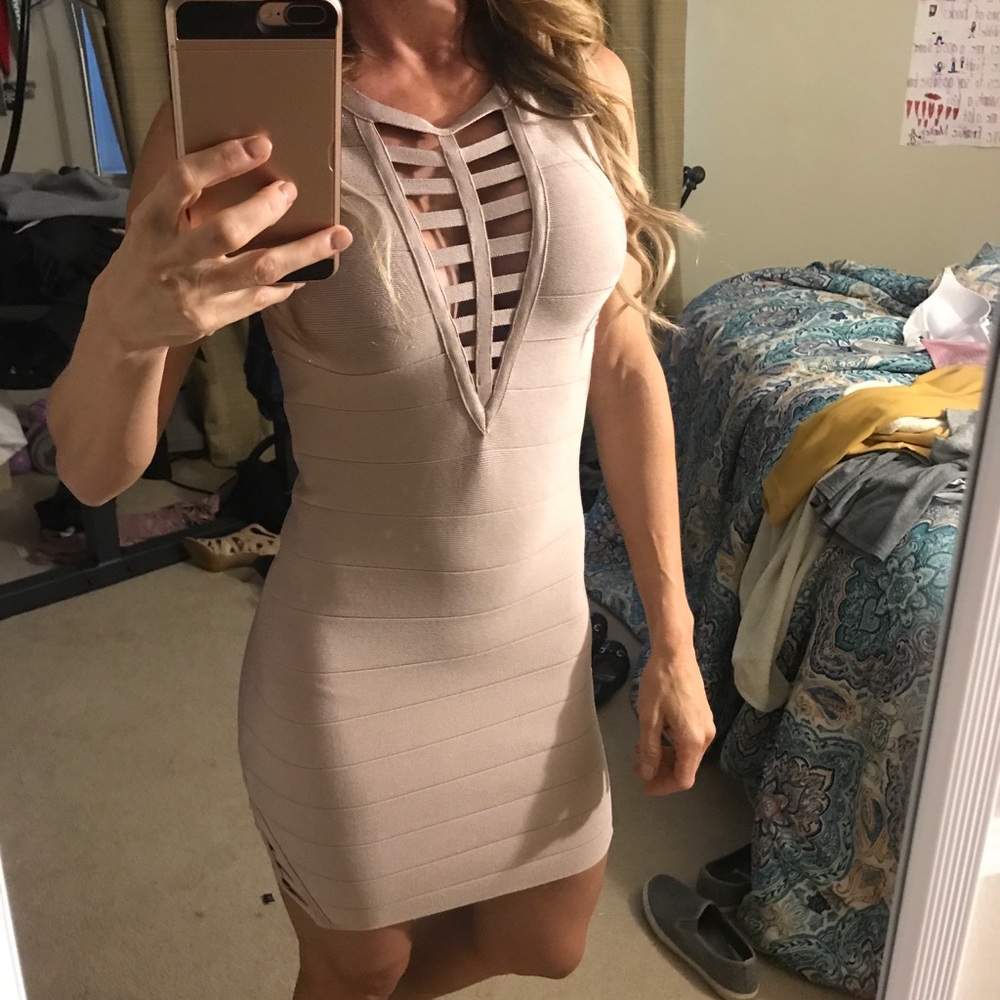 Bebe bandage dress with caging details Never worn!