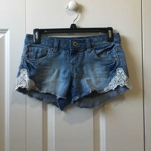 Lace denim shorts