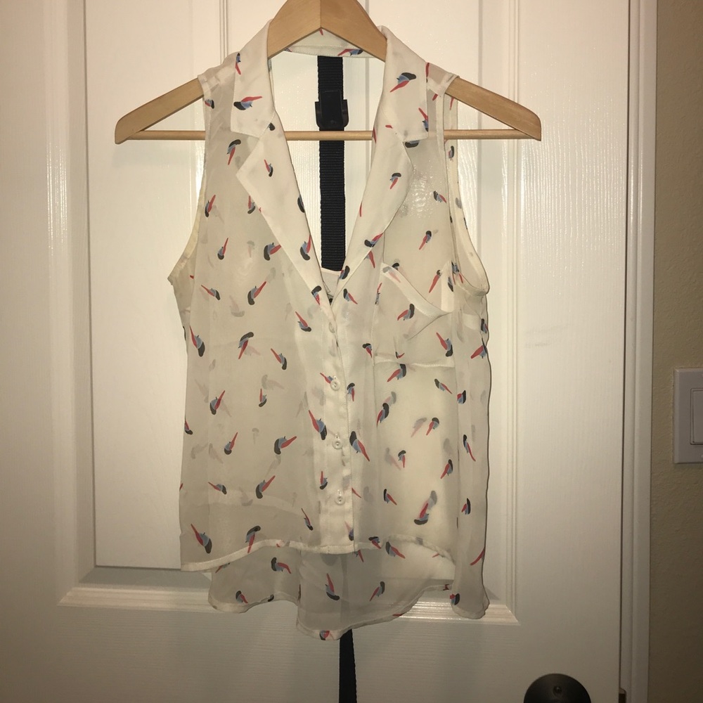 Cream printed sleeveless blouse