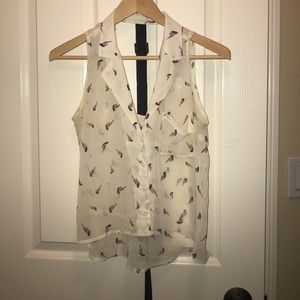 Cream printed sleeveless blouse