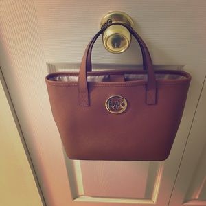 Michael Kors jet set travel luggage