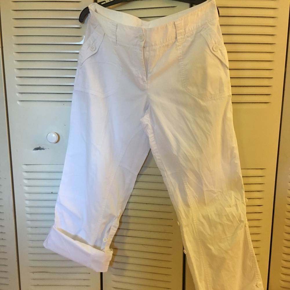 Calvin Klein white pants turning in to Capri.