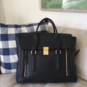 3.1 Philip Lim  Black Pashli textured trapeze bag