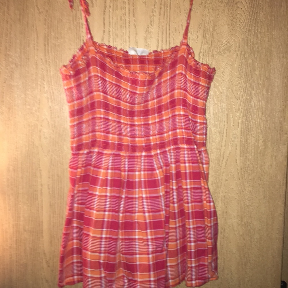 Cute flannel tank top.