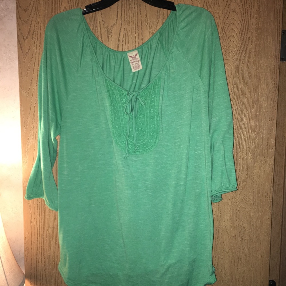 Green blouse.