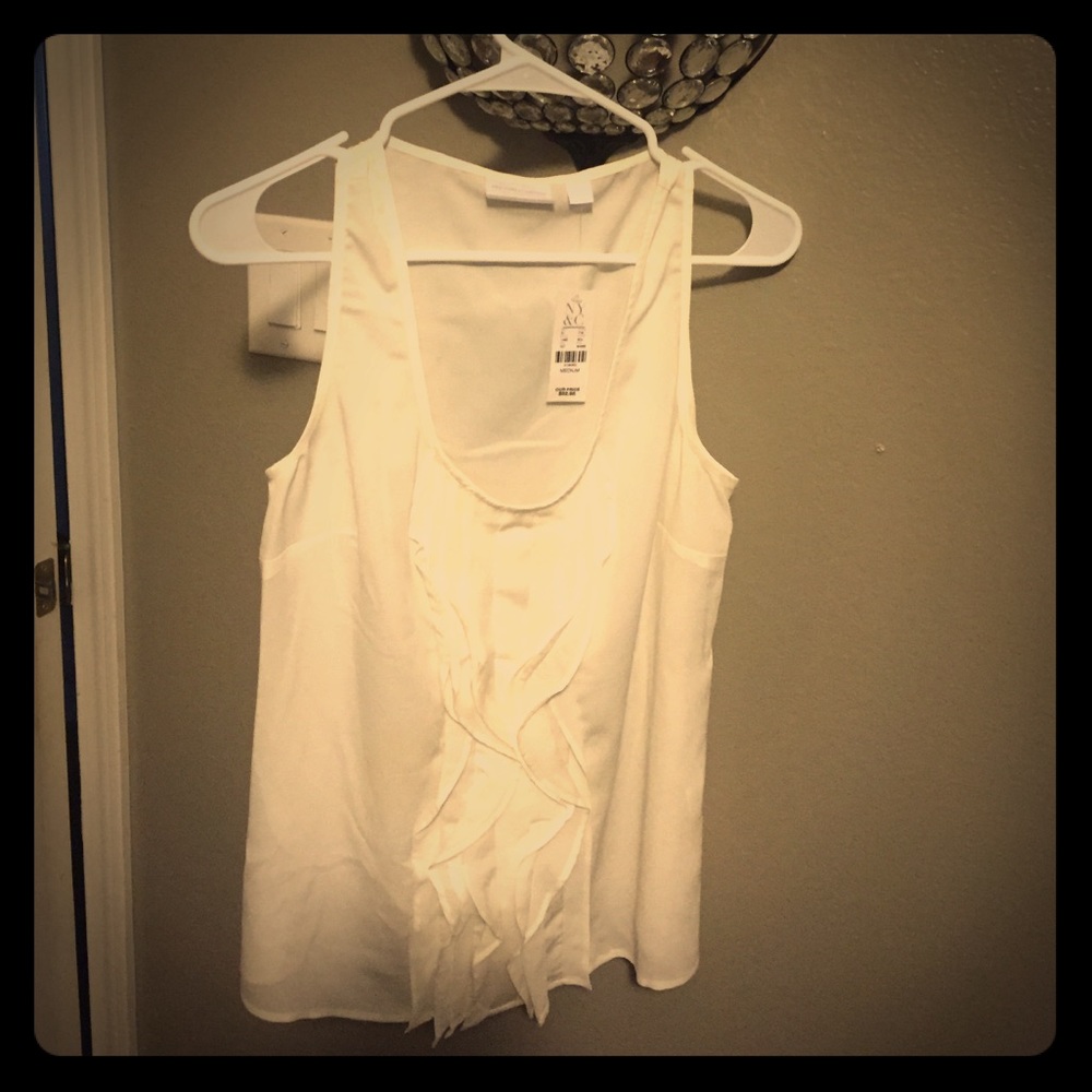 Off whitewith ruffles.