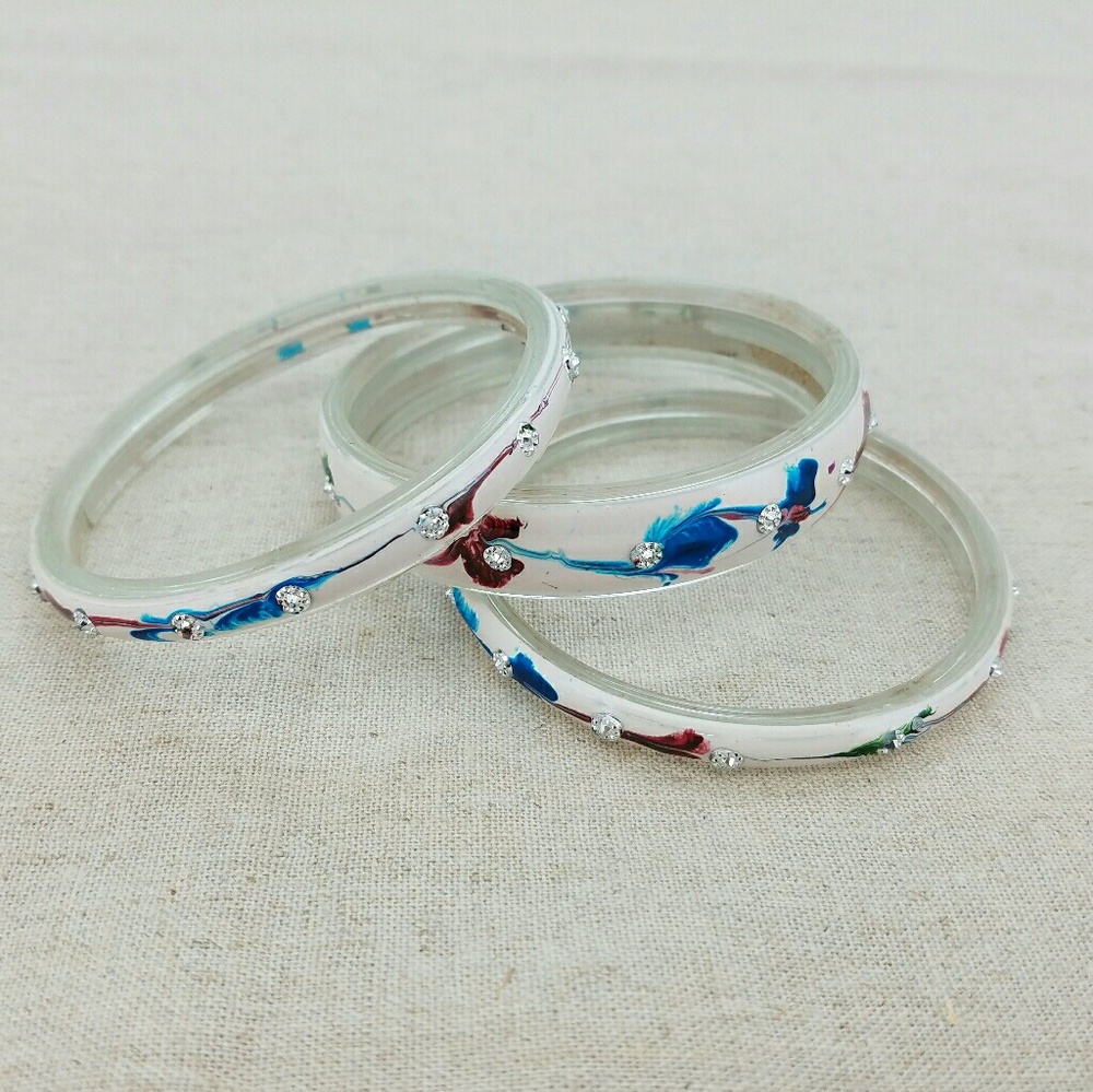 Studded white bangles with splash of watercolor