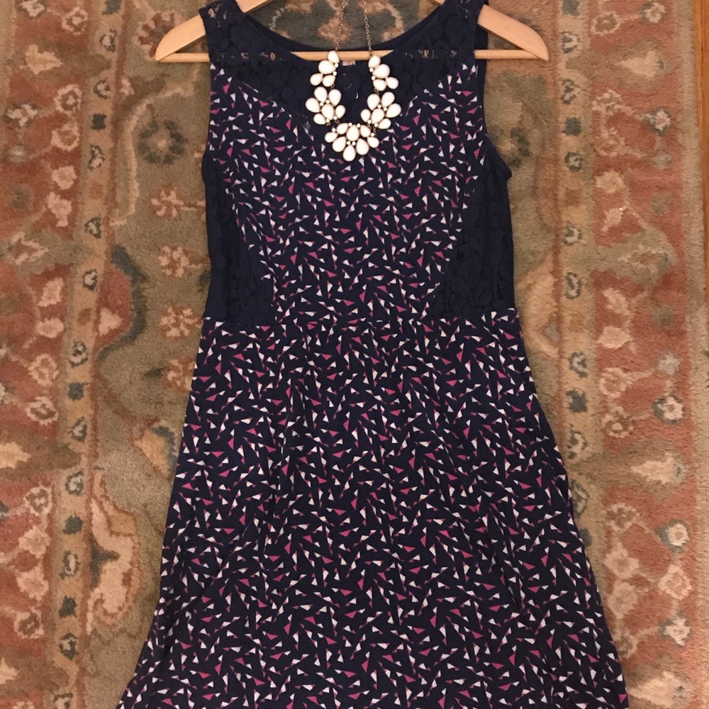 Navy dress with geographic pattern and lace trim