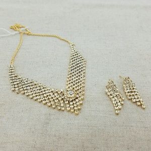 Diamond and gold necklace with matching earrings