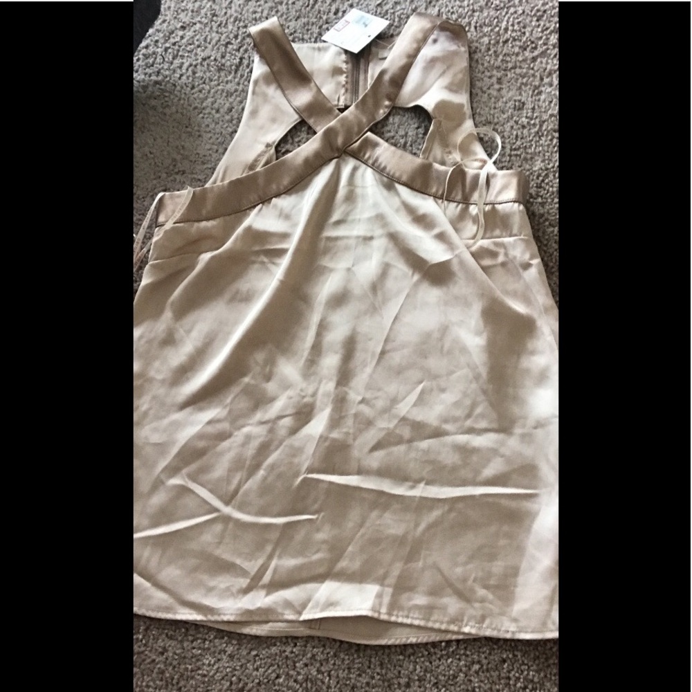 Women's gold sleeveless dress