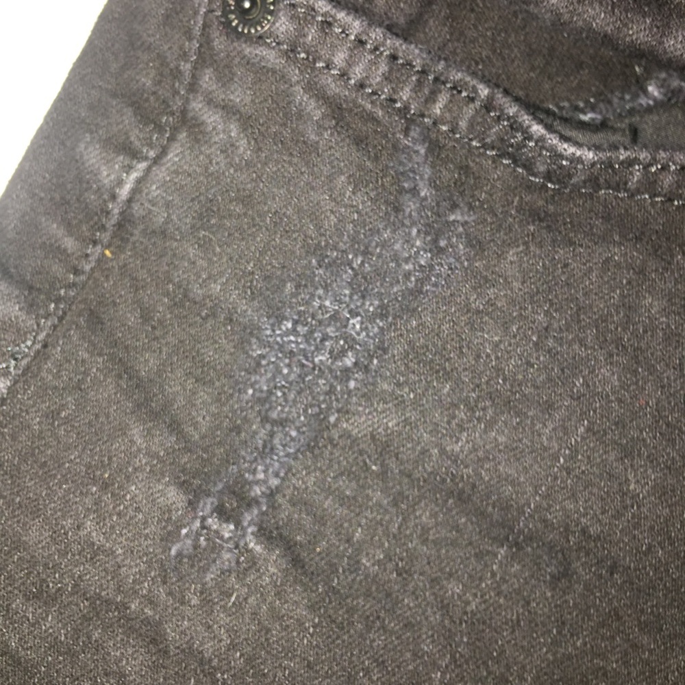 Slightly distressed, cheeky black shorts