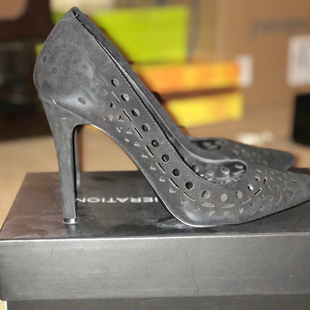 Black Suede heels. Worn one time. Still in box!