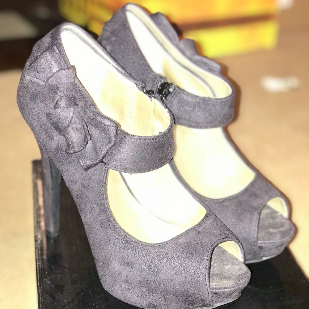 Black Suede peep toe heels! Worn once.