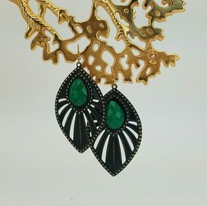 Black and gold earring with green