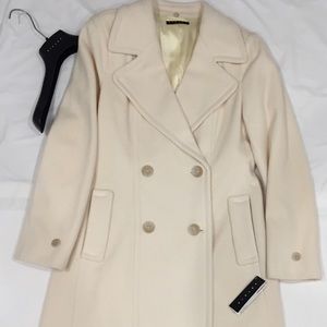 Long cream Sisley wool coat.