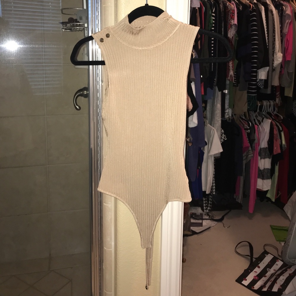 Ribbed nude turtle neck body suit