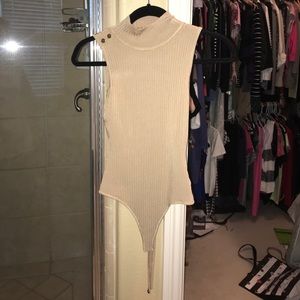 Ribbed nude turtle neck body suit