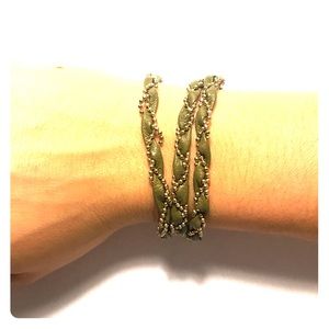 Olive green and gold tone wrap bracelet