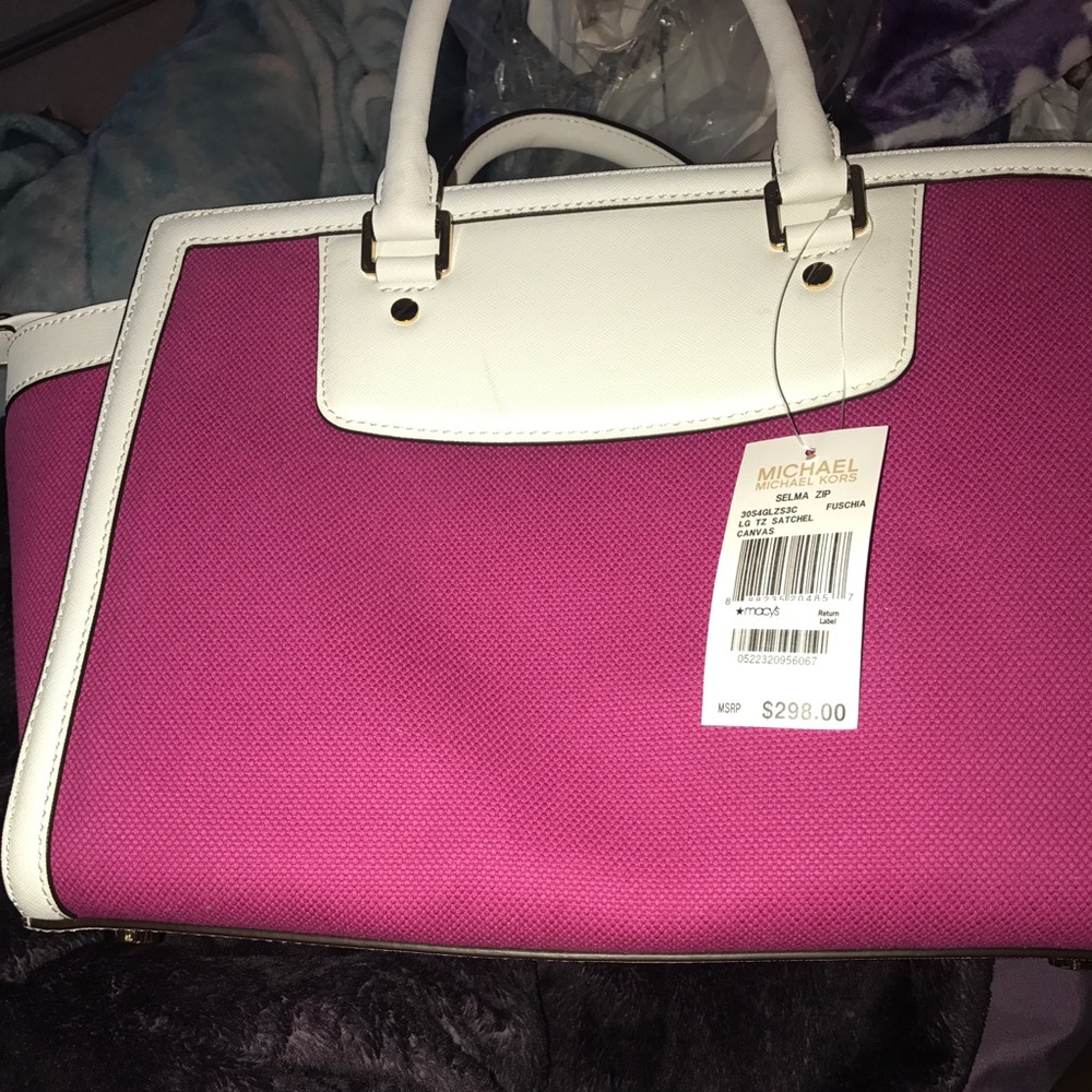 Pink and white Selma Bag by Michael Kors
