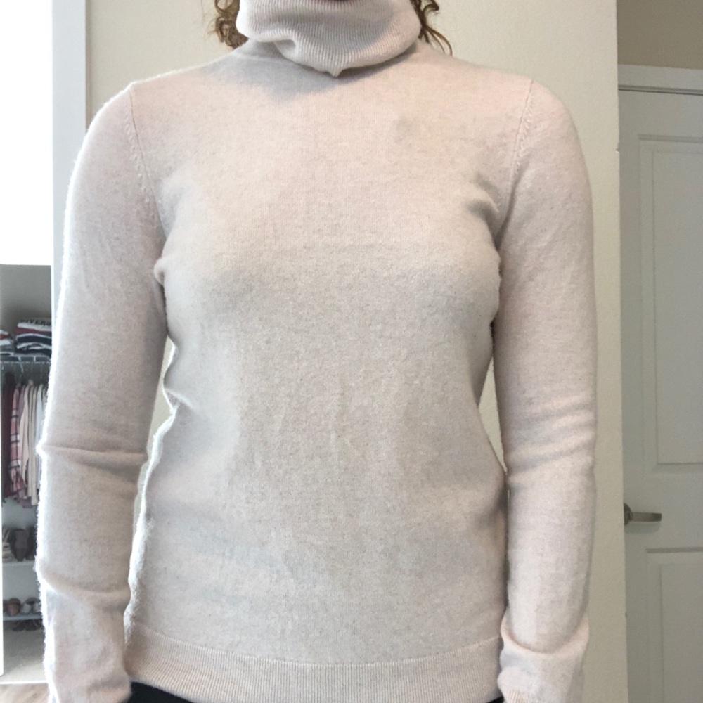 Women’s soft cream turtleneck sweater