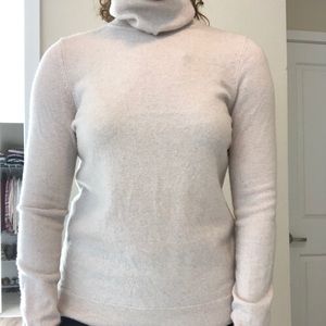 Women’s soft cream turtleneck sweater