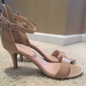 Nude patent leather heels