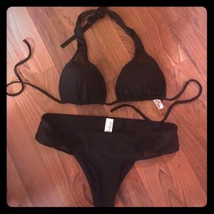 Luli Fama black bikini size small w mesh. Like new