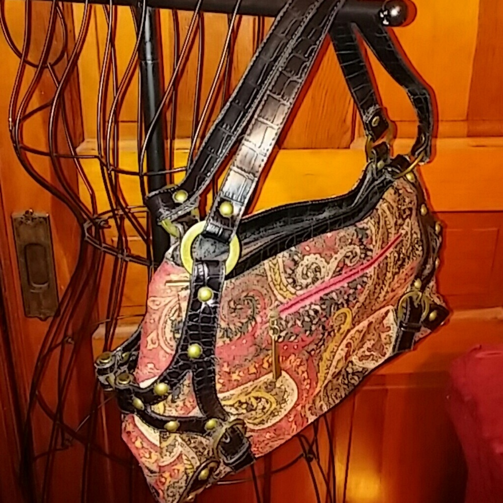 Soft gold, burnt red, tan, brown, and black purse